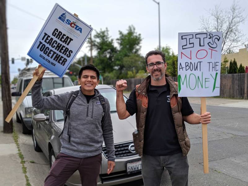 Spanish teacher Erik Saucedo and art teacher Jesse Carew, both from Hiram W. Johnson High School, both stressed the importance of electives and offering their students new opportunities to grow during a one-day teachers strike in Sacramento on April 11, 2019.