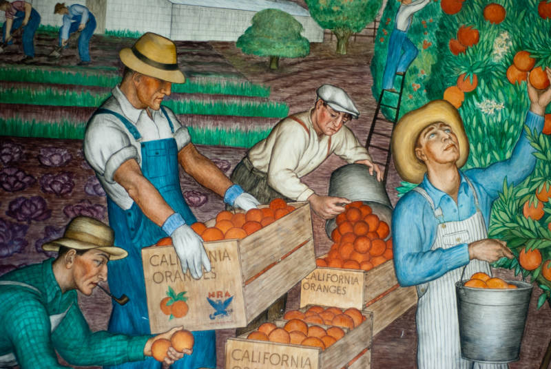 The Great Depression-era murals might be even more impressive than the view from the top.