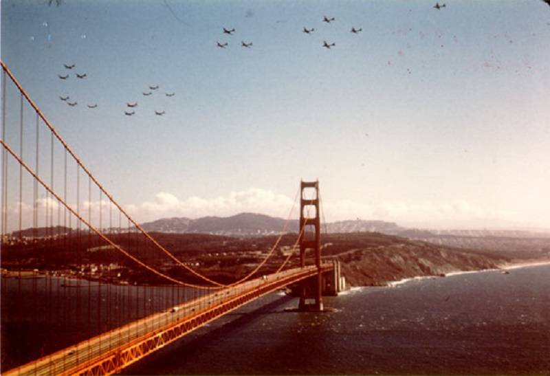 A color image of 20 B-29s flying over the Golden Gate Bridge on October 3, 1946.