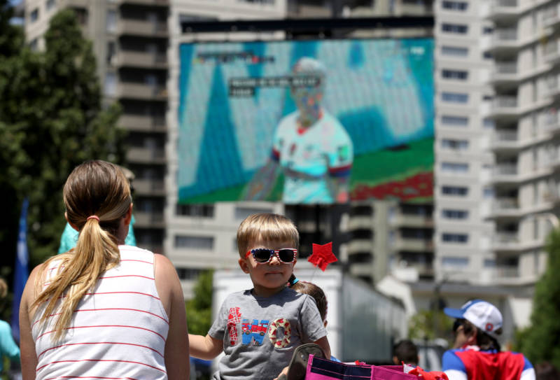 A young soccer fan wears patriotic sunglasses while attending a watch party of the U.S. women's soccer team versus Sweden in its final group stage match at the 2019 Women's World Cup on June 20, 2019 in San Francisco.