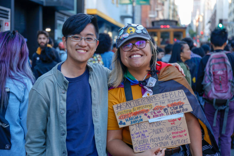 Teo Octavia (R), poses with friend and fellow API Equality member, Ethan Li (L). Teo is a documentary filmmaker and organizer who specifically works with queer transgender Asian American youth in Oakland. 'For me Pride means building resilience and healing among our youth so they can continue to persist and resist until they’ve reached their wildest dreams and fulfilled their wildest visions. To know that they belong, that they have a home, and that they will be powerful change-makers today and in the future.'