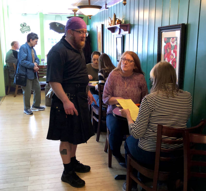 Tyx Pulskamp greets customers at Rosebud's Cafe. He says the restaurant has always been a safe space.
