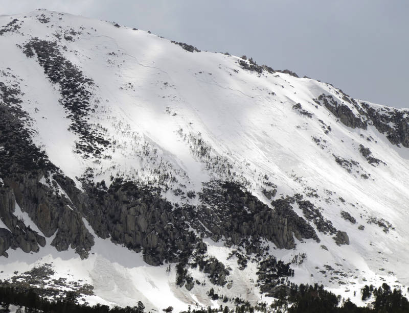 Wet slab avalanches in Rock Creek Canyon above Half Moon Bowl at about 12,000 feet.