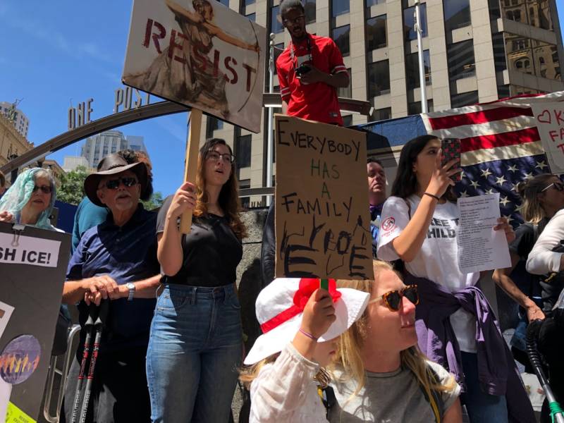 Juliana Monin with her daughter Evelina Petta, 4, of Oakland, at a protest in downtown San Francisco on July 2, 2019, calling for the facilities housing migrant families and children to close.