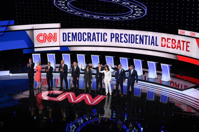 Democratic presidential hopefuls wave from the stage ahead of the second Democratic primary debate of the 2020 presidential campaign season hosted by CNN at the Fox Theatre in Detroit, Michigan, on July 31, 2019.