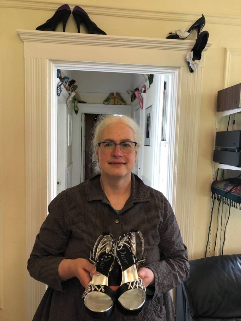 Fashion historian Melissa Leventon shows off a pair of shoes from her historic shoe collection at her home in San Francisco.