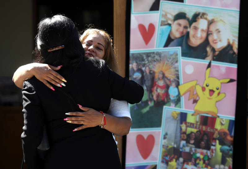 Mourners embrace before the start of funeral services for 13-year-old Keyla Salazar at Our Lady of Guadalupe Parish on Aug. 6, 2019, in San Jose. Funeral services were held for Keyla, one of three people shot and killed at the Gilroy Garlic Festival on July 28. 