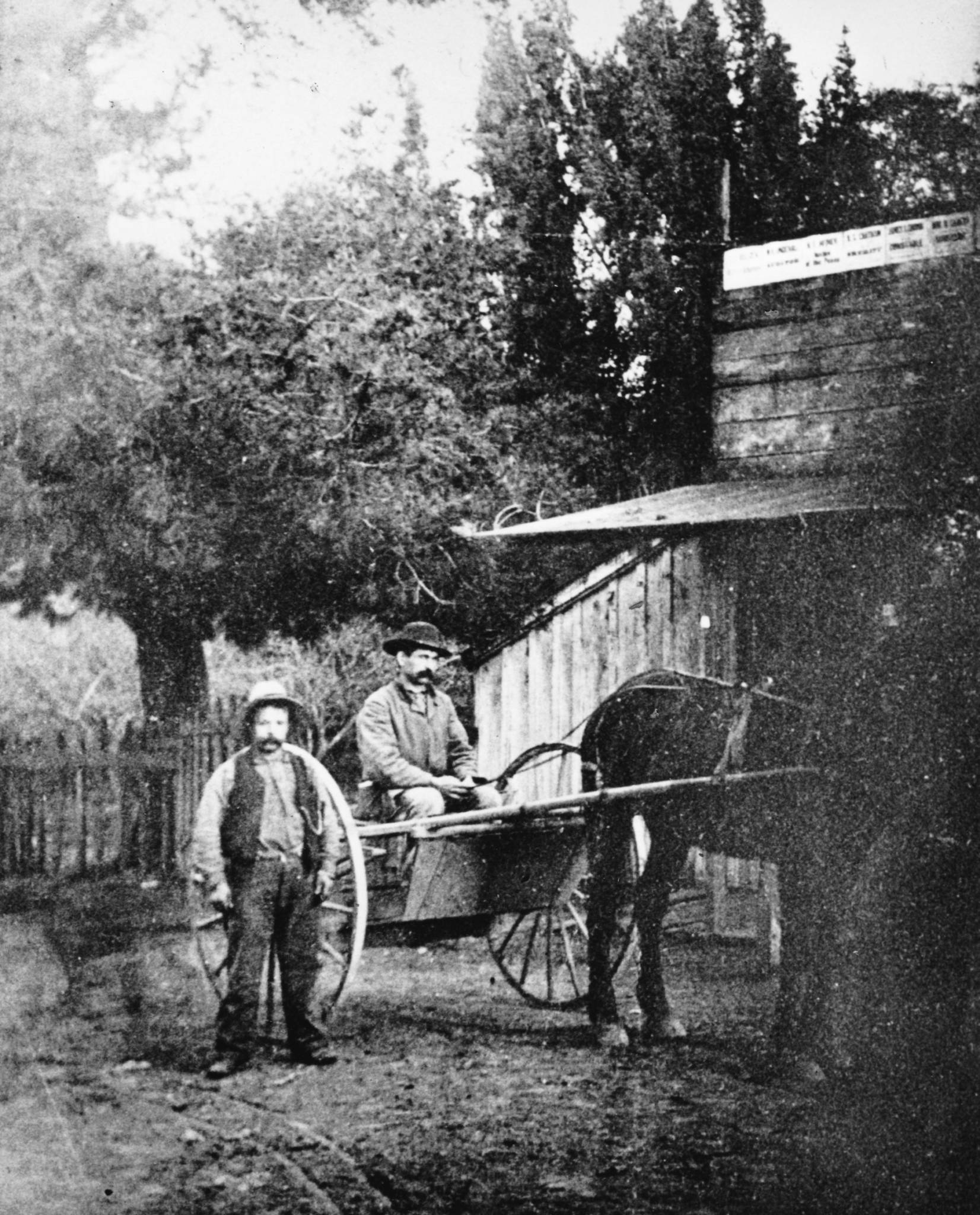 The earliest known photo of Casa de Tableta, c. 1880 - 1890s. By 1868, Felix Buelna had sold the property to William Stanton. Buelna’s grandson believes that his grandfather lost all of his property in a rigged poker game at the Searsville Saloon. Pictured here is barkeeper Rodriguez “Jo” Crovello with Stanton in front of the inn, then called “Black Chapete’s.”
