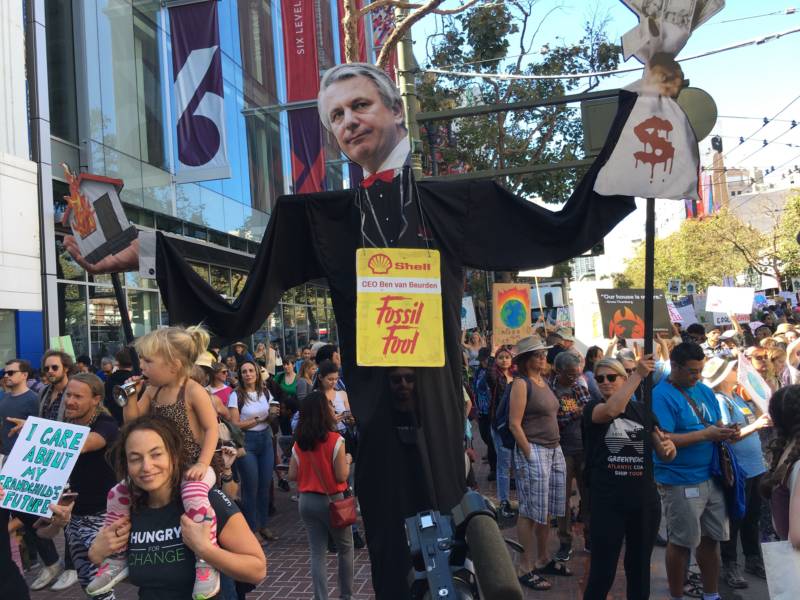 An effigy of Shell CEO Ben van Beurden hovers above the crowd during a youth-led climate march on Sept. 20, 2019.