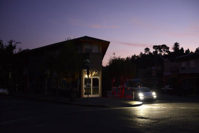 The Public Safety Power Shutoffs darken a street corner in Oakland's Montclair neighborhood. 
