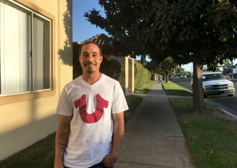 Jovan Bravo, 31, at the Stockton Economic Empowerment Demonstration headquarters. Bravo is one of 125 residents receiving $500 a month from the pilot project. Some say the concept, often called universal basic income, could offer a solution to the income inequality that plagues the city and state.