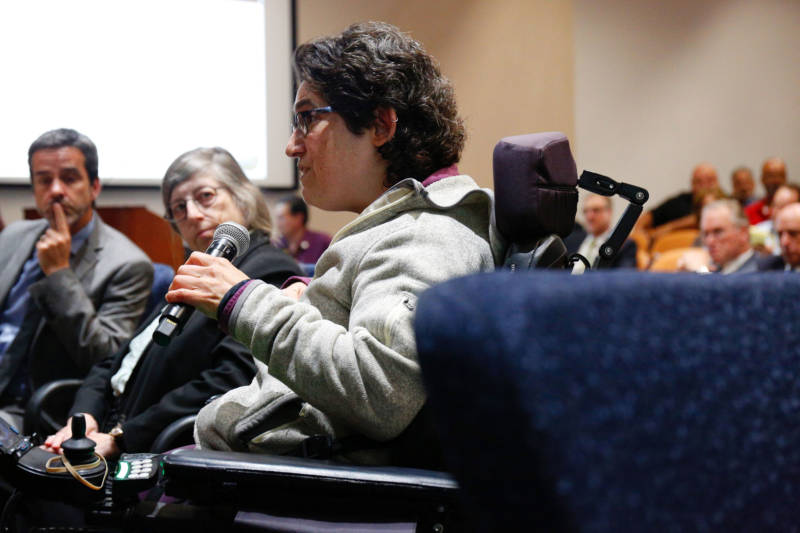 Marissa Shaw of Richmond, a member of the disability community, speaks during the public comment period of Friday's CPUC meeting. Shaw said she was not informed about PG&E's power outage because she's not eligible for the medical baseline program, since her landlord pays her utility bill.