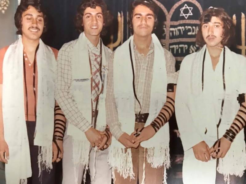 The reunion slideshow included photos of Jewish students in pre-Revolution Iran. At the time, Ettefagh School had a synagogue in the school, where both Jewish and non-Jewish students attended morning prayers together.