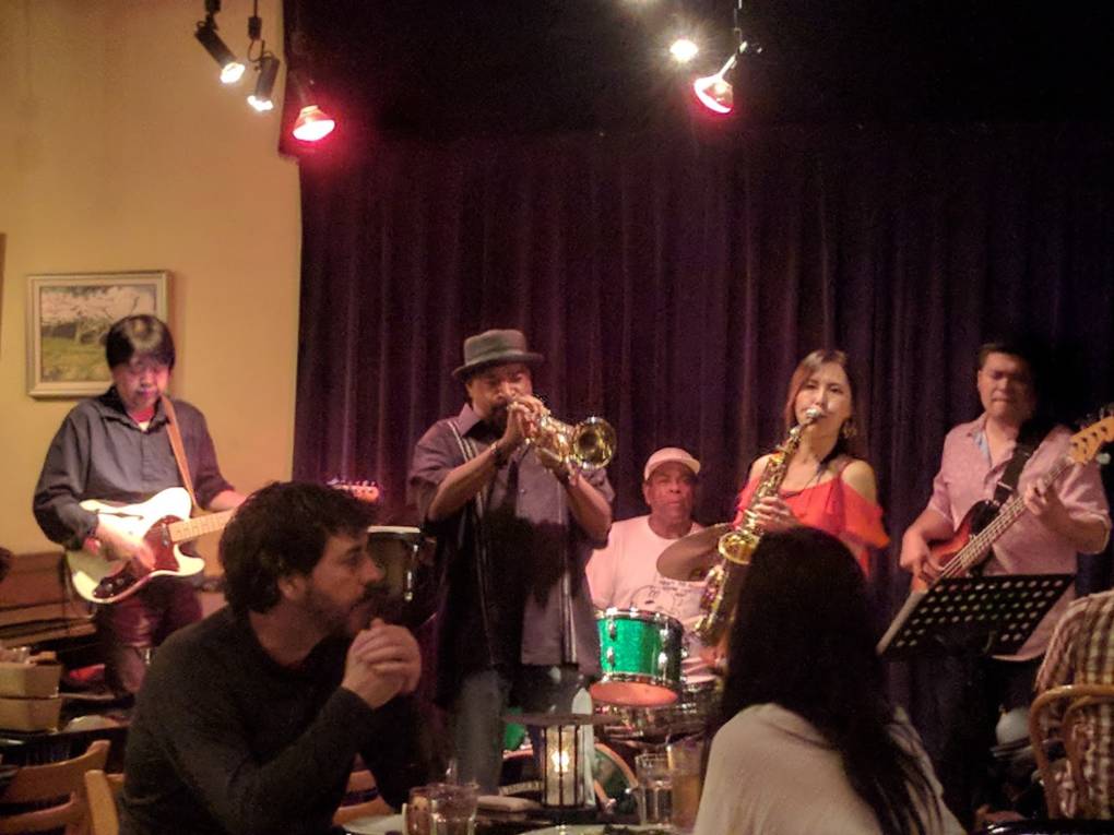 Sax player Otoe Mori, trumpeter Marty Arvan and band perform at Main Street Bistro in Guerneville. 