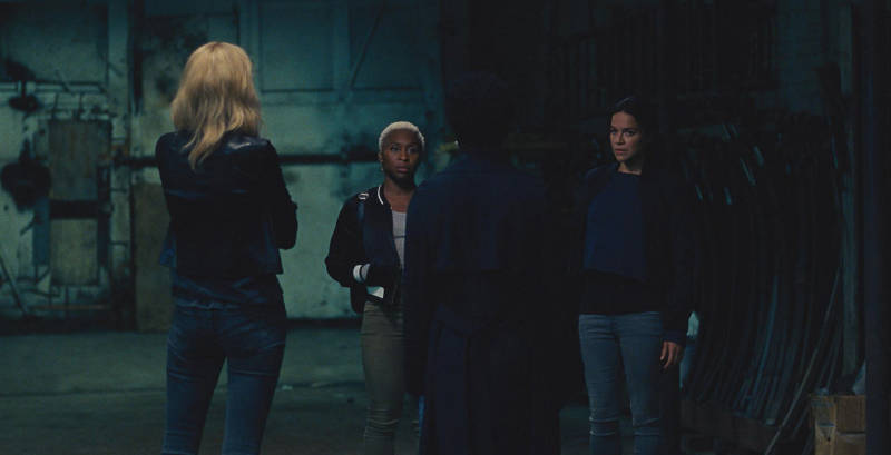 L-R: Elizabeth Debicki (back to camera), Cynthia Erivo, Viola Davis (back to camera), and Michelle Rodriguez star in 'Widows'. 