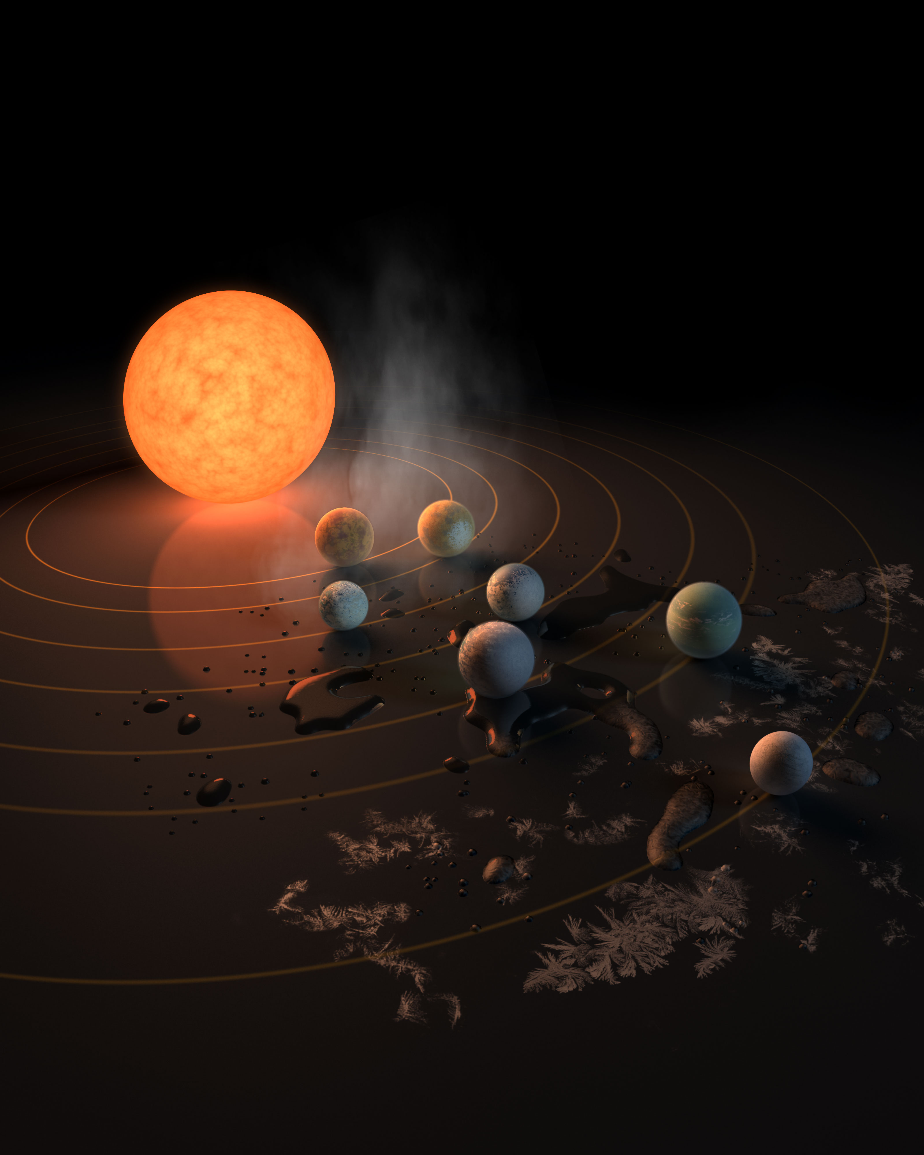 The TRAPPIST-1 star, an ultra-cool dwarf, has seven Earth-size planets orbiting it. This artist's concept appeared on the cover of the journal Nature on Feb. 23, 2017. 