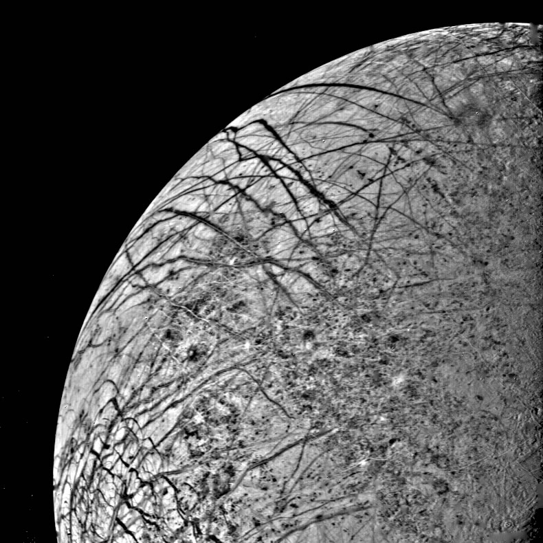 One of the first detailed pictures of Europa and its cracked, icy surface, taken by Voyager 2 in 1979.