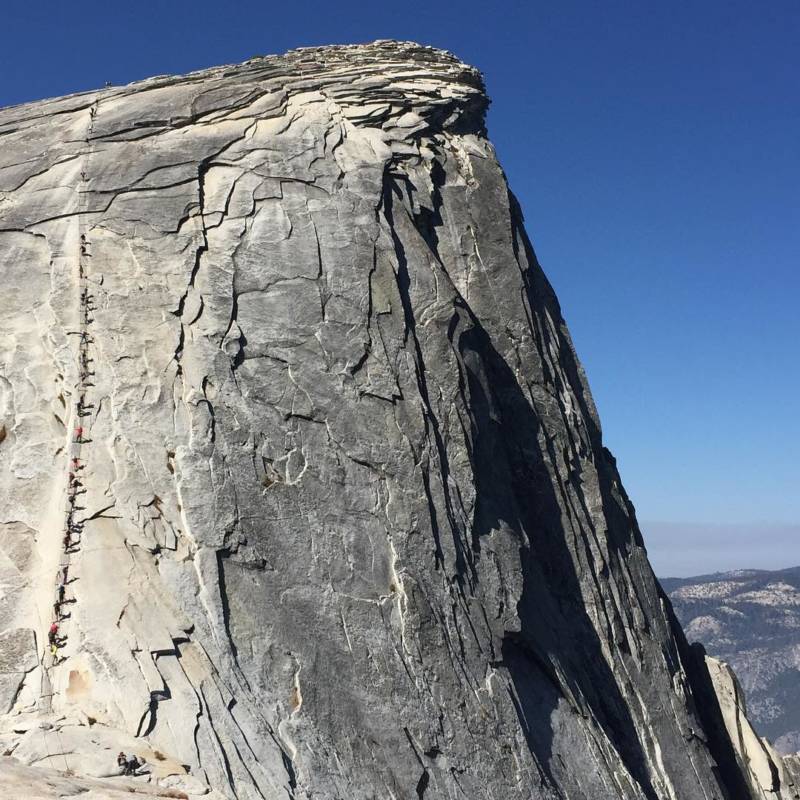 From @girlseestheworld, via Instagram. '"All glory comes from daring to begin." -Ruskin Bond Before reaching the cables on Half Dome, there's a steep climb up sub dome with many switchbacks. At the top of the sub dome, I was already tired and breathless. The views were amazing. To reach the top of Half Dome, there's another 800 feet of rock waiting for you.'
