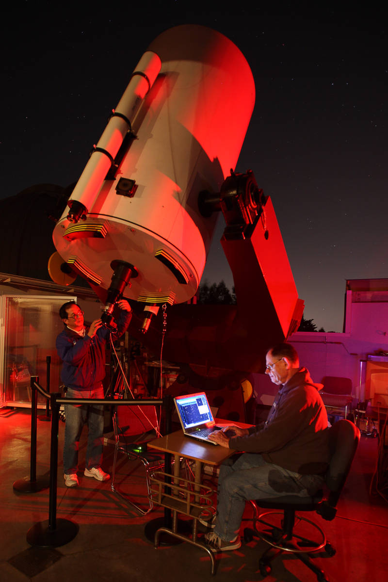 Chabot astronomers Gerald McKeegan and Conrad Jung, using the 36-inch telescope, Nellie, to track Near Earth Objects.