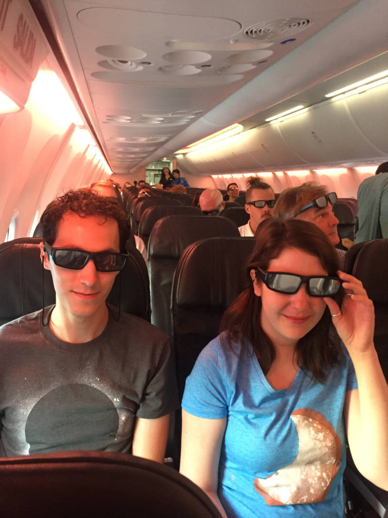 Solar eclipse chasers prepare for takeoff on an Alaska Airlines flight Monday morning. 