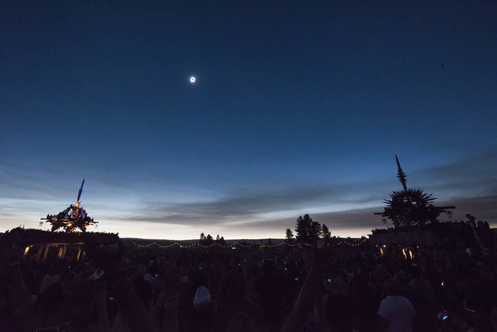 A 360-degree sunset surrounds viewers of the solar eclipse between the Solar Temples at Big Summit Prairie ranch in Oregon's Ochoco National Forest near the city of Mitchell.