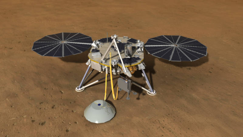 Artist illustration of InSight on the surface of Mars. The SEIS seismometer instrument is showed on the ground after being deployed by InSight's robotic arm. 