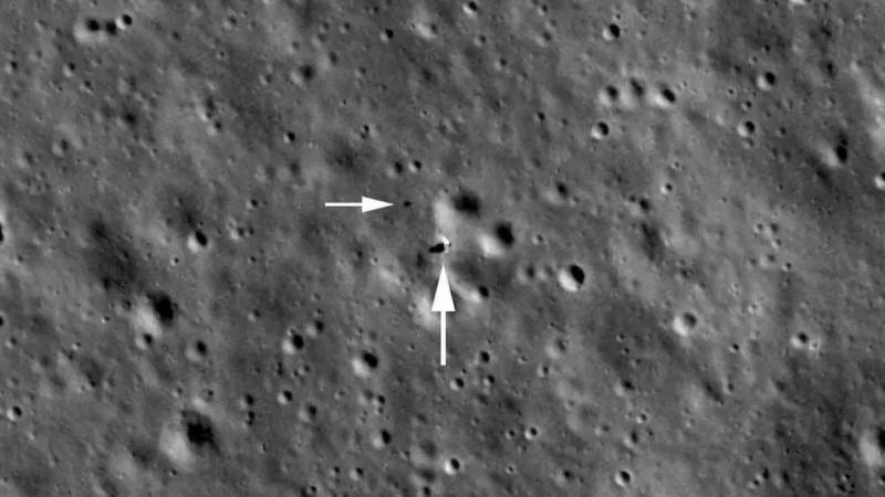 Picture of Chang'e 4 (center) and its Yutu-2 rover (smaller spot toward the upper left), captured by NASA's Lunar Reconnaissance Orbiter when it passed 50 miles above. 
