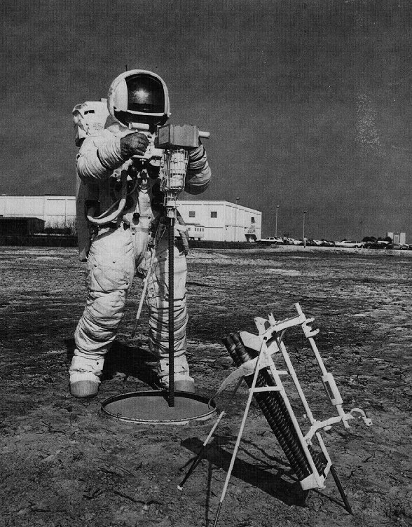 Battery powered hammering rock drill used by Apollo astronauts to collect lunar samples. Picture shows testing of the device at the Kennedy Space Center. 