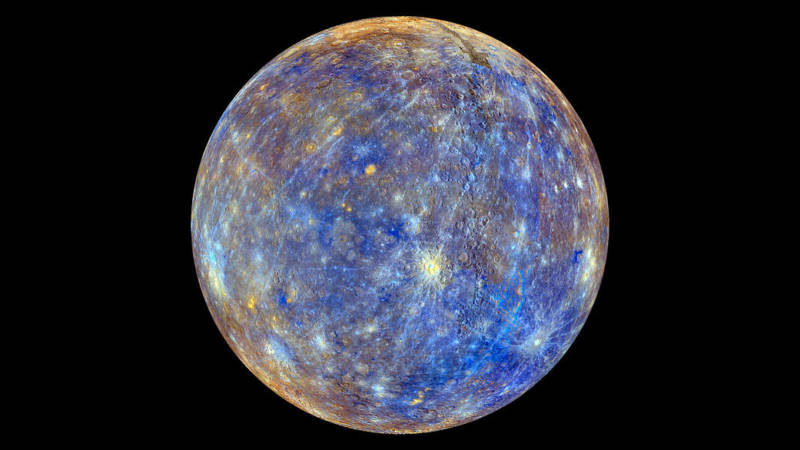 A false color image of the planet Mercury captured by NASA's MESSENGER spacecraft. The colors represent differences in chemical and mineralogical composition on Mercury's surface. 