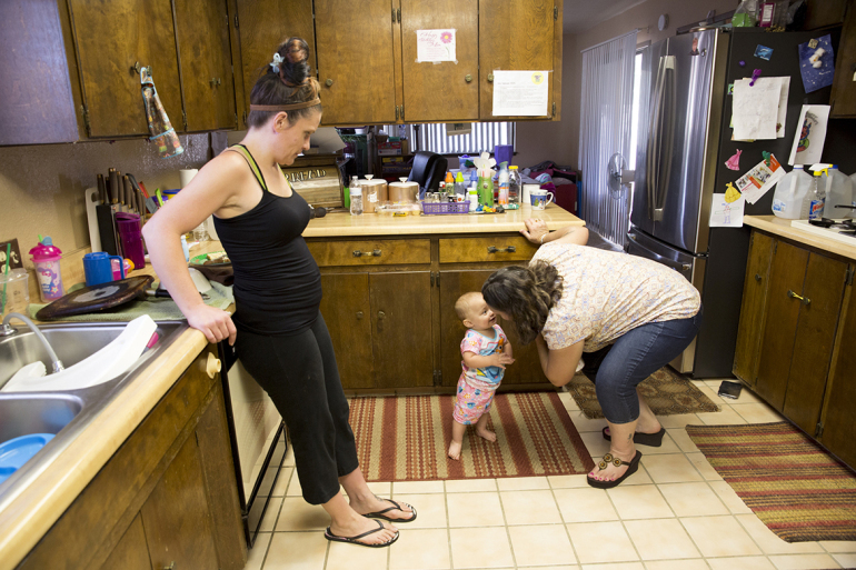 After Heather Menzel takes her methadone prescription on a summer morning in 2016, she goes into the kitchen and watches her daughter, Bella, play with Menzel’s mother, Tawanna Maxwell-Cecil, at their home in Lake Isabella, Calif. 